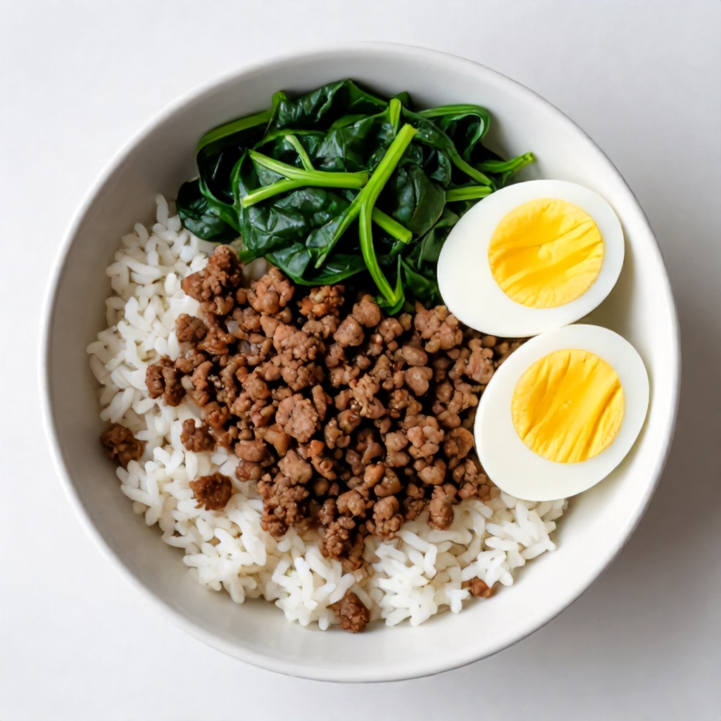Healthy Meal Prep Bowls Featuring Rice, Meat, Spinach, and Eggs