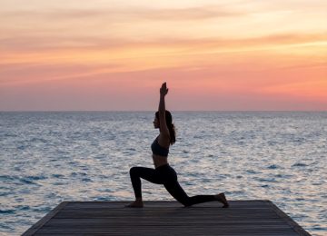 Mastering Low Lunge Pose During Golden Hour Oceanfront Yoga Practice
