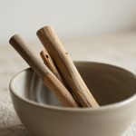 Simple Organic Minimalist Decor Using Natural Wooden Sticks in a Bowl