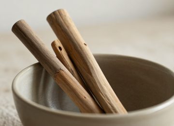 Simple Organic Minimalist Decor Using Natural Wooden Sticks in a Bowl